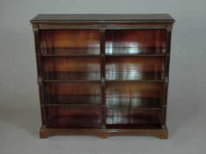 Appraisal: A mahogany open bookcase early th century the gadrooned top