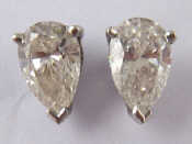 Appraisal: A pair of white metal tests carat gold pear shape