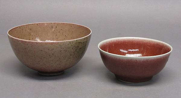 Appraisal: Two red glazed porcelain bowls The first of th Century