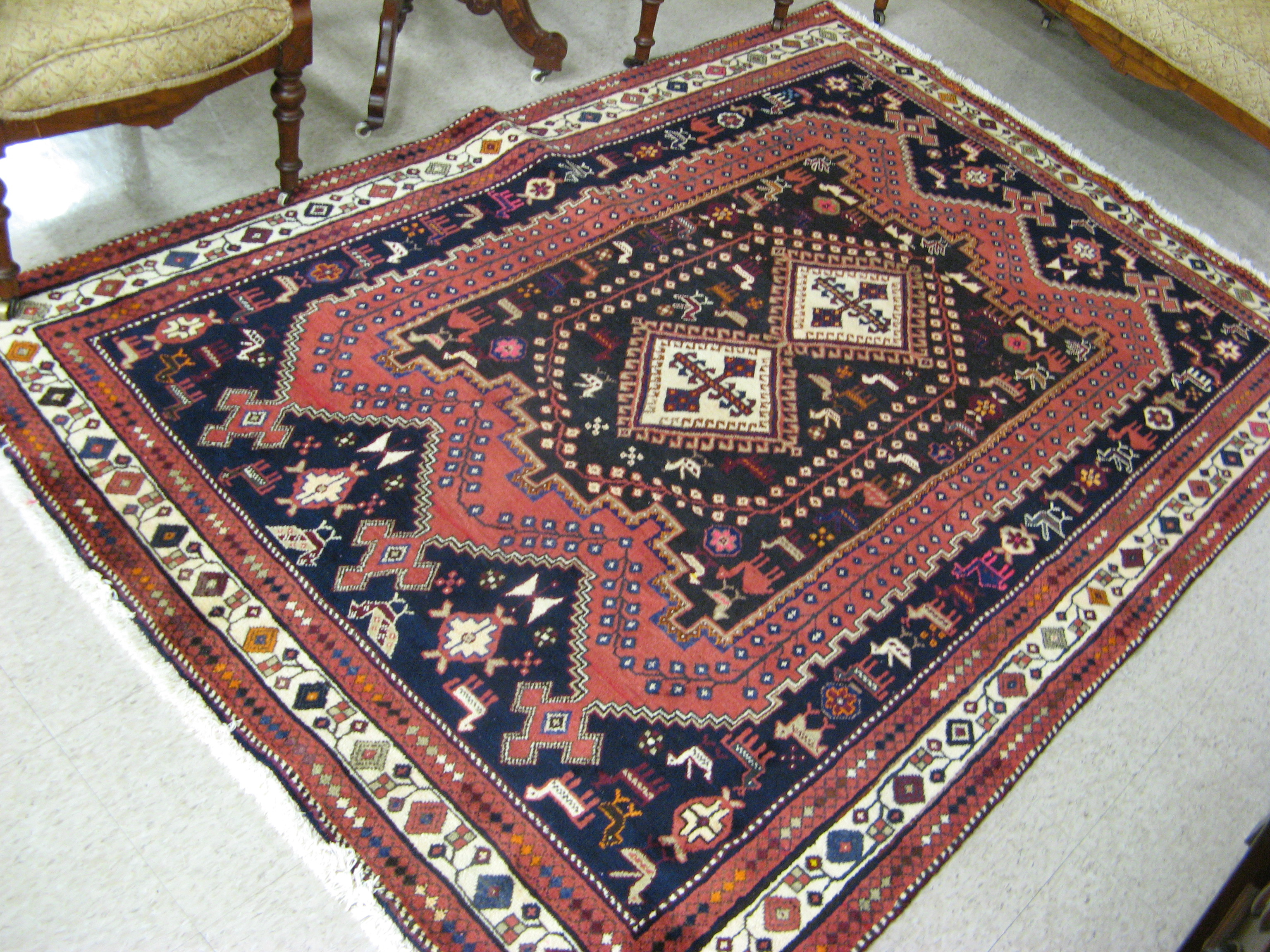 Appraisal: PERSIAN SIRJAN AFSHARI AREA RUG double geometric medallion stylized flowers