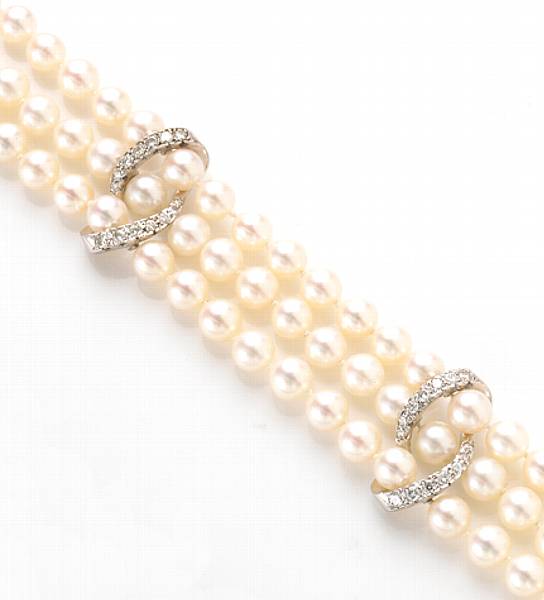 Appraisal: A cultured pearl diamond and k white gold double strand