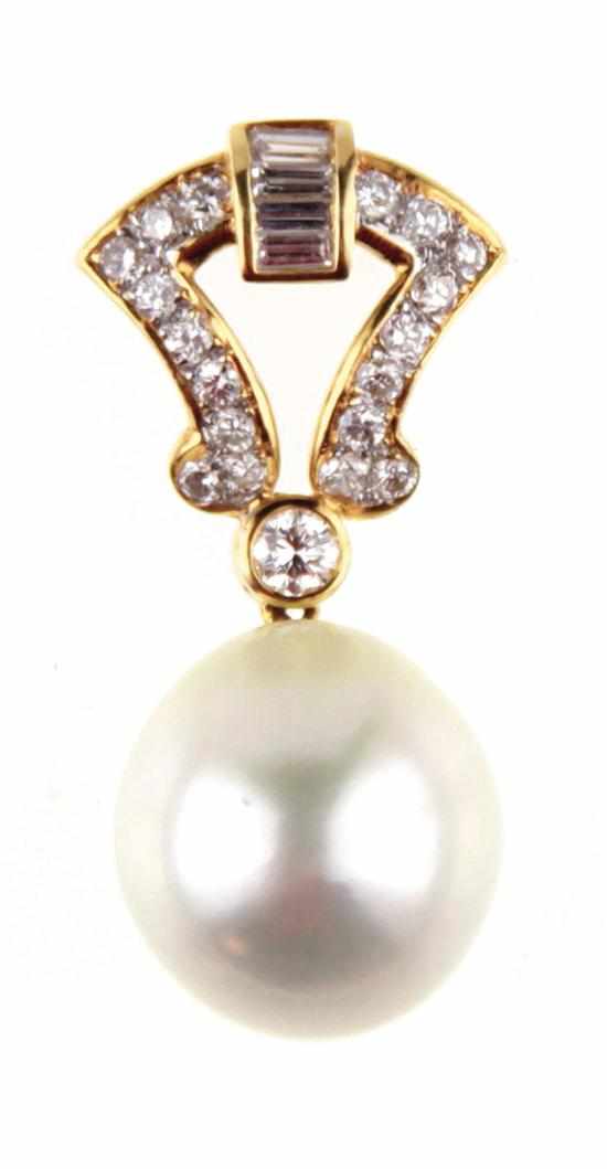 Appraisal: South Sea pearl and diamond pendant x mm pearl suspended