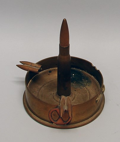 Appraisal: Ashtray constructed from bullets and base of mm shell Attachments