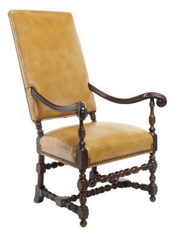 Appraisal: Louis XIII style highback armchair in leather upholstery fixed with