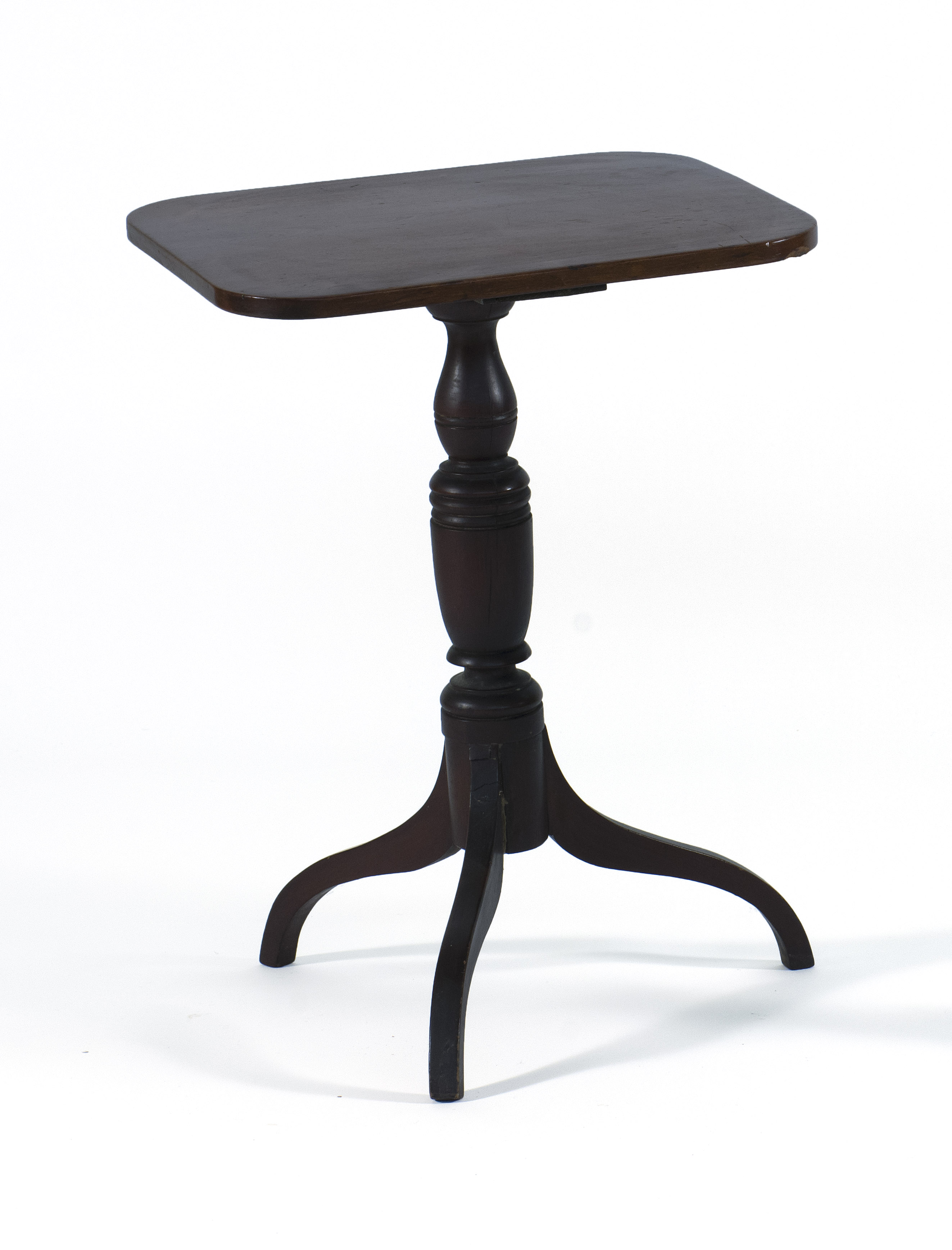 Appraisal: ANTIQUE AMERICAN CANDLESTAND Circa In mahogany Rectangular top with rounded