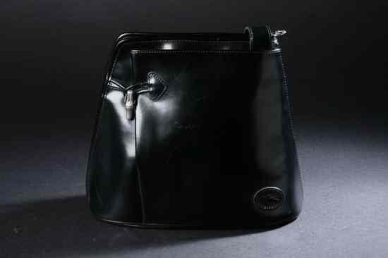 Appraisal: LONGCHAMP BLACK LEATHER HANDBAG Single compartment interior with two side