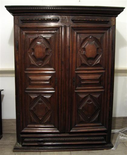 Appraisal: Italian Baroque walnut and iron mounted cupboard th century and