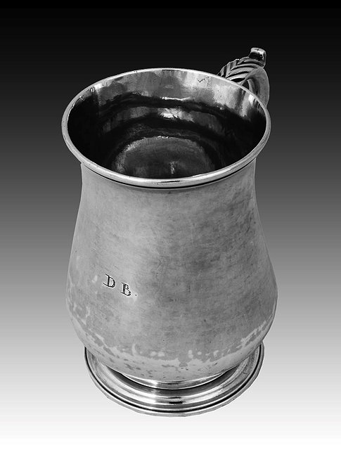 Appraisal: A GEORGE III SILVER HALF PINT SIZE BALUSTER SHAPED TANKARD