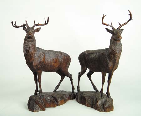 Appraisal: OUTSTANDING PAIR OF CARVED BLACK FOREST STAGS th th Century