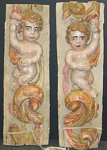 Appraisal: A pair of Italian Baroque polychrome and carved wood figural