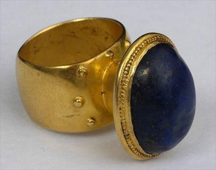 Appraisal: PERSIAN LAPIS AND GOLD RING Size Provenance Property from the