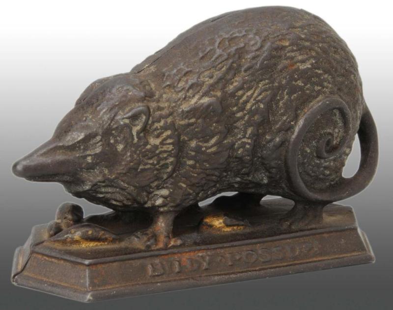 Appraisal: Cast Iron Billy Possum Still Bank Description Manufactured by J