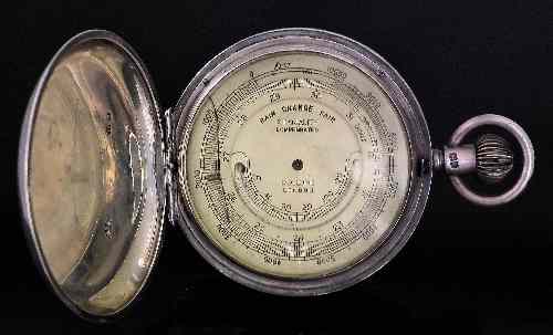 Appraisal: A George V silver cased pocket aneroid barometer by Dollond