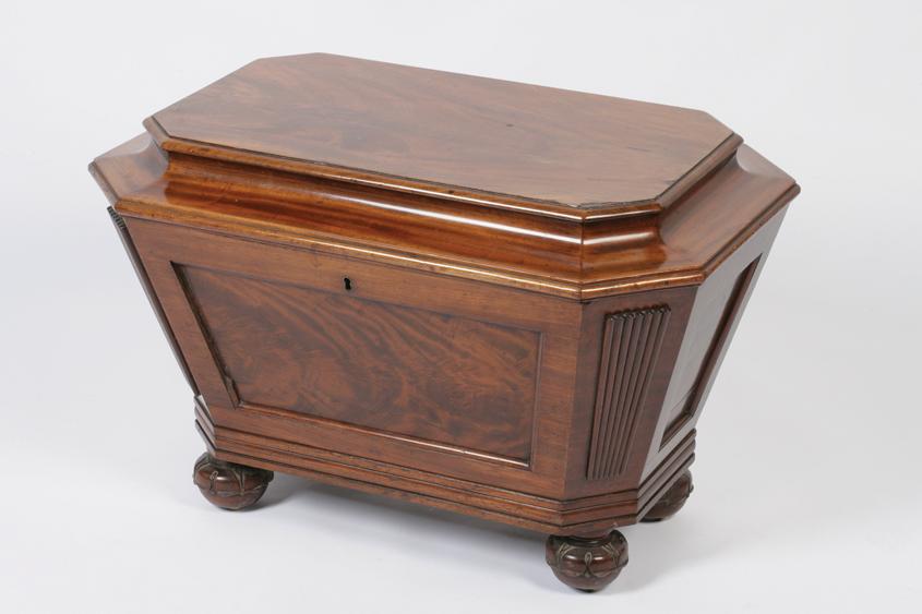 Appraisal: A WILLIAM IV MAHOGANY SARCOPHAGUS FORM WINE COOLER the rectangular