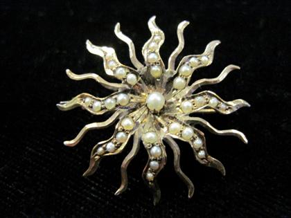 Appraisal: Sunburst broochLow karat rose gold and split seed pearls