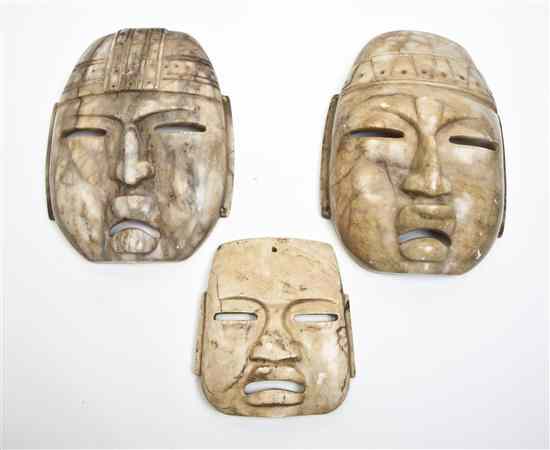 Appraisal: A Group of Three Olmec Style Carved Stone Masks each