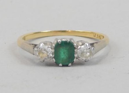 Appraisal: An ct gold emerald and diamond dress ring with central