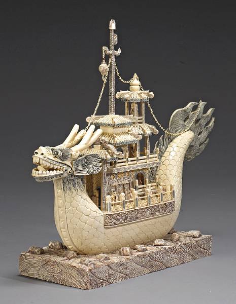 Appraisal: A large pieced and tinted bone dragon boat Decorated with