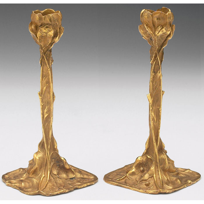 Appraisal: Art Nouveau candle holders pair bronzed metal with a golden