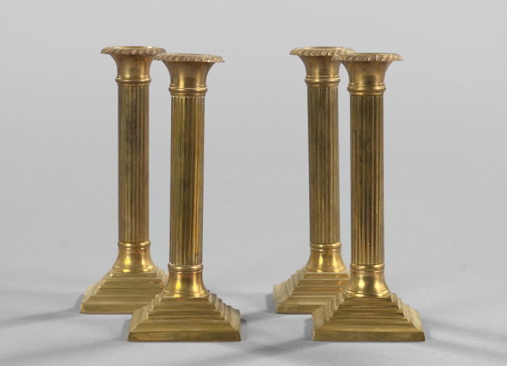 Appraisal: Group of Four English Gilt-Brass Candlesticks in the Late Georgian