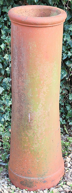 Appraisal: A TALL CYLINDRICAL TERRACOTTA CHIMNEY POT cm high