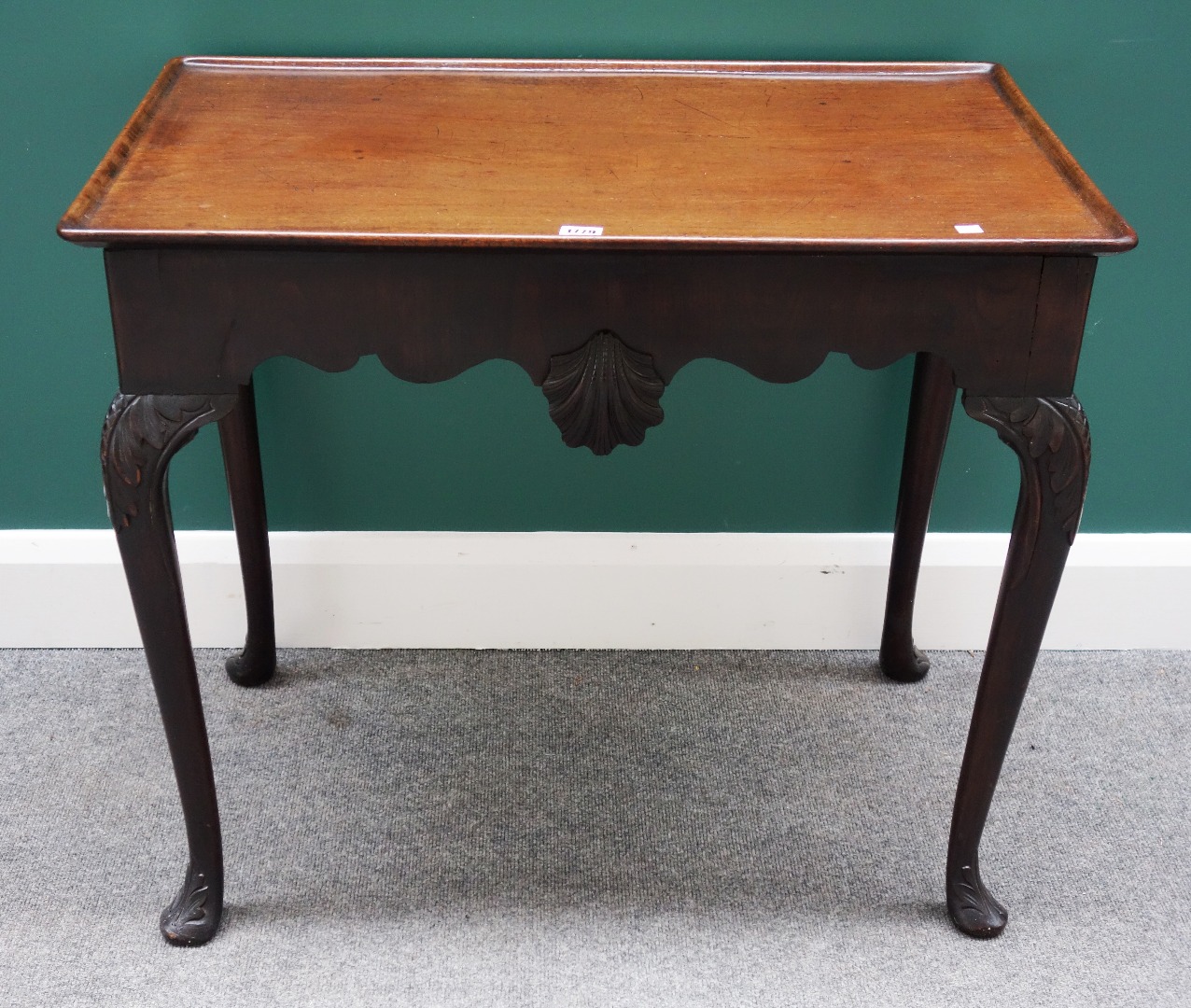 Appraisal: An th century style mahogany silver table the dished rectangular