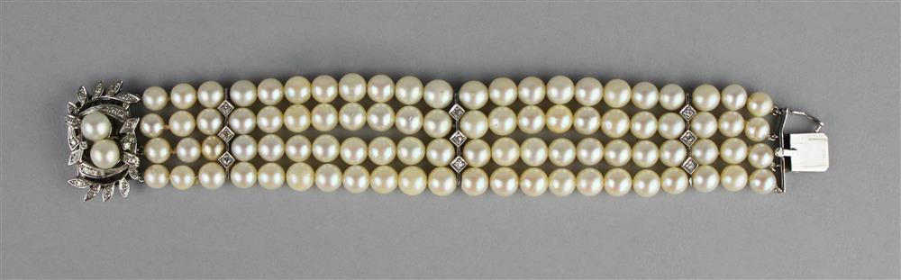 Appraisal: FOUR STRAND CULTURED PEARL BRACELET WITH A DECORATIVE K DIAMOND