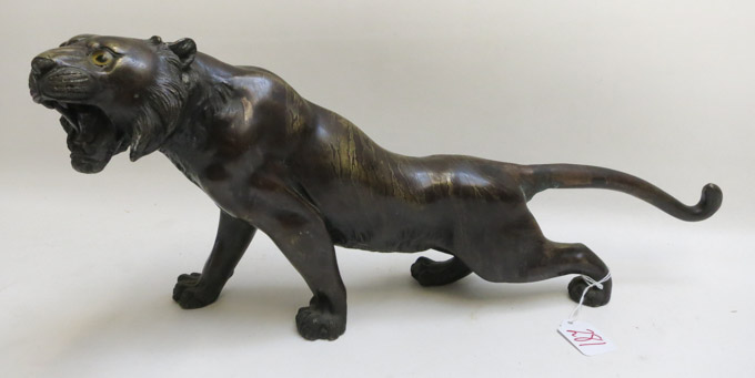 Appraisal: JAPANESE BRONZE WILDLIFE SCULPTURE model of a walking tiger with