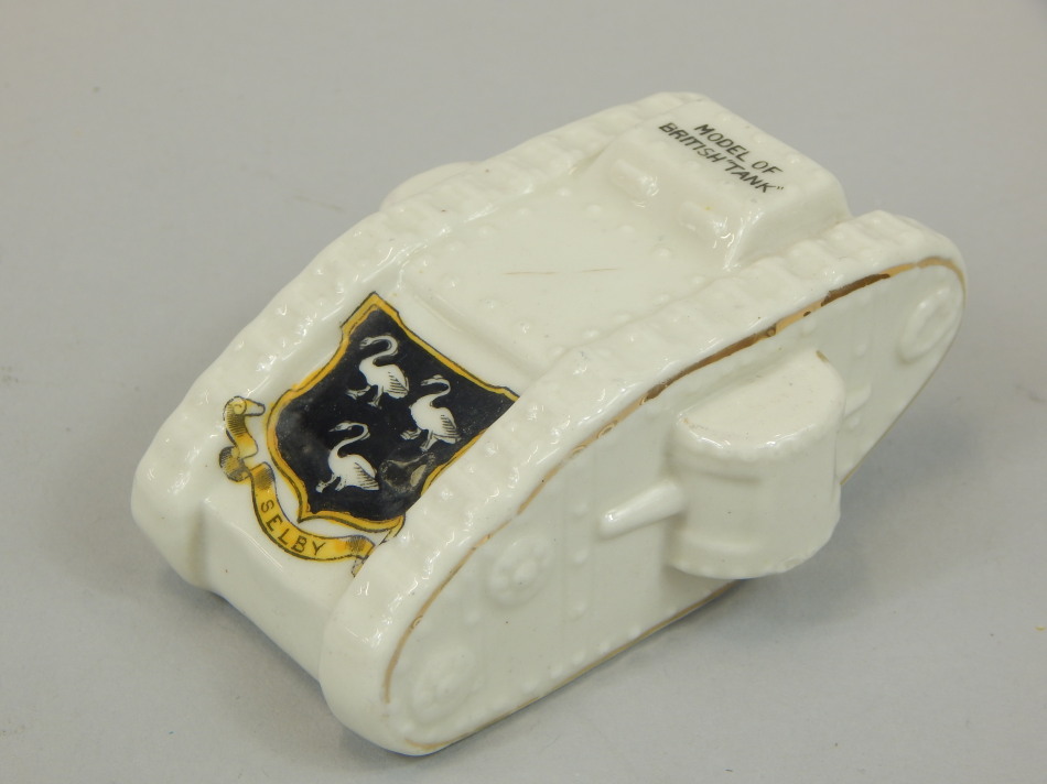 Appraisal: A crested porcelain figure of a British tank printed crest