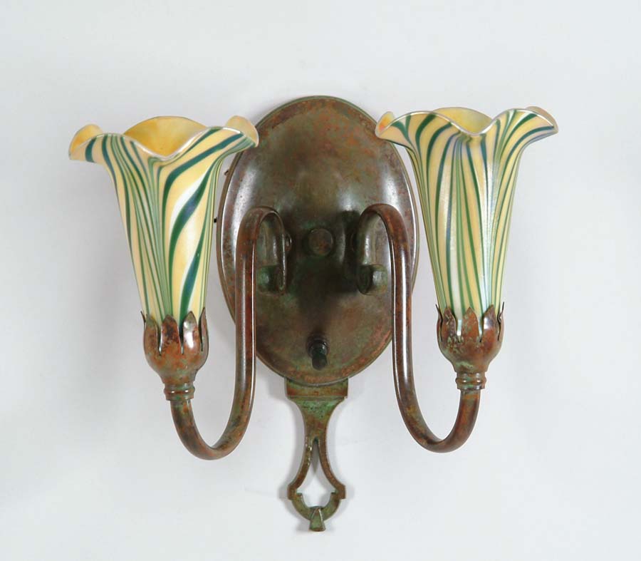 Appraisal: QUEZAL WALL SCONCE Wonderful bronze Art Nouveau wall sconce has