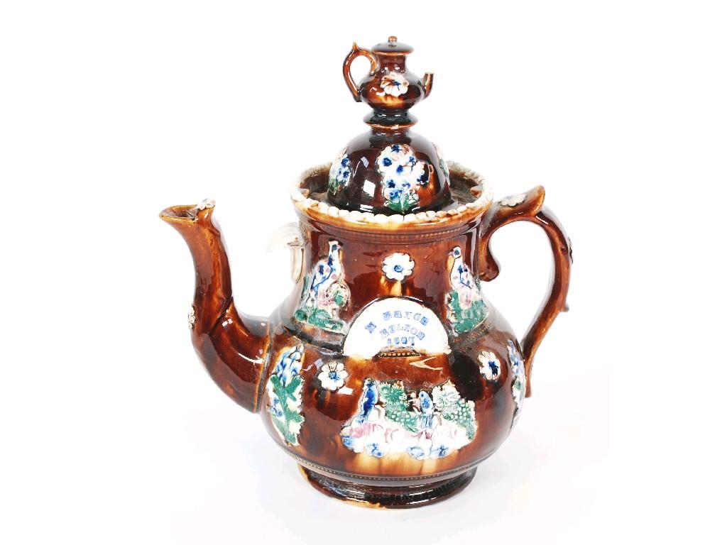 Appraisal: LARGE VICTORIAN BARGEWARE TEAPOT typical form with domed cover and