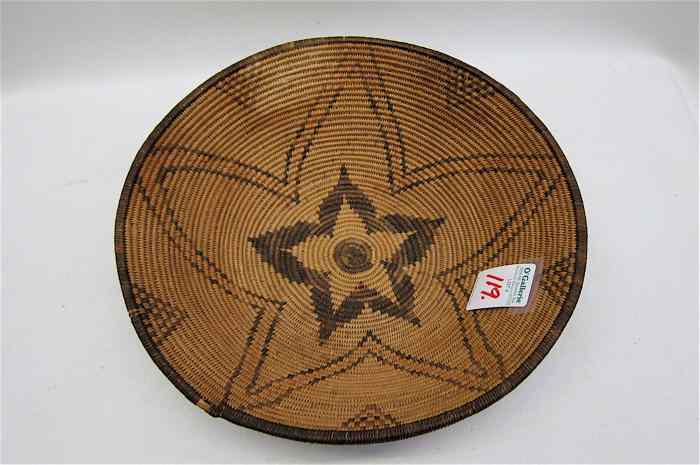 Appraisal: AN APACHE INDIAN BASKET BOWL having distinctive star design center