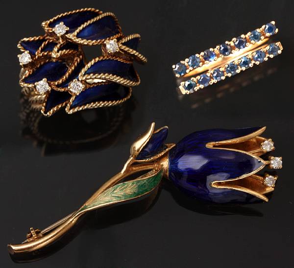 Appraisal: A collection of enamel diamond sapphire and gold jewelry comprising