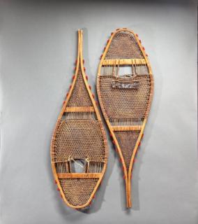 Appraisal: Two Sets of Snowshoes A pair of bearpaw-style snowshoes by