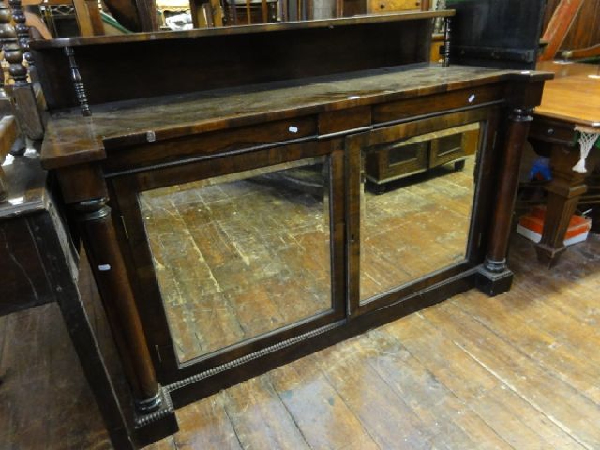 Appraisal: An early th century rosewood side cupboard enclosed by two