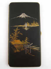 Appraisal: A Japanese cigarette case with gold and silver inlay depicting