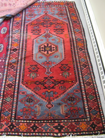 Appraisal: TWO PERSIAN TRIBAL AREA RUGS both hand knotted wool '