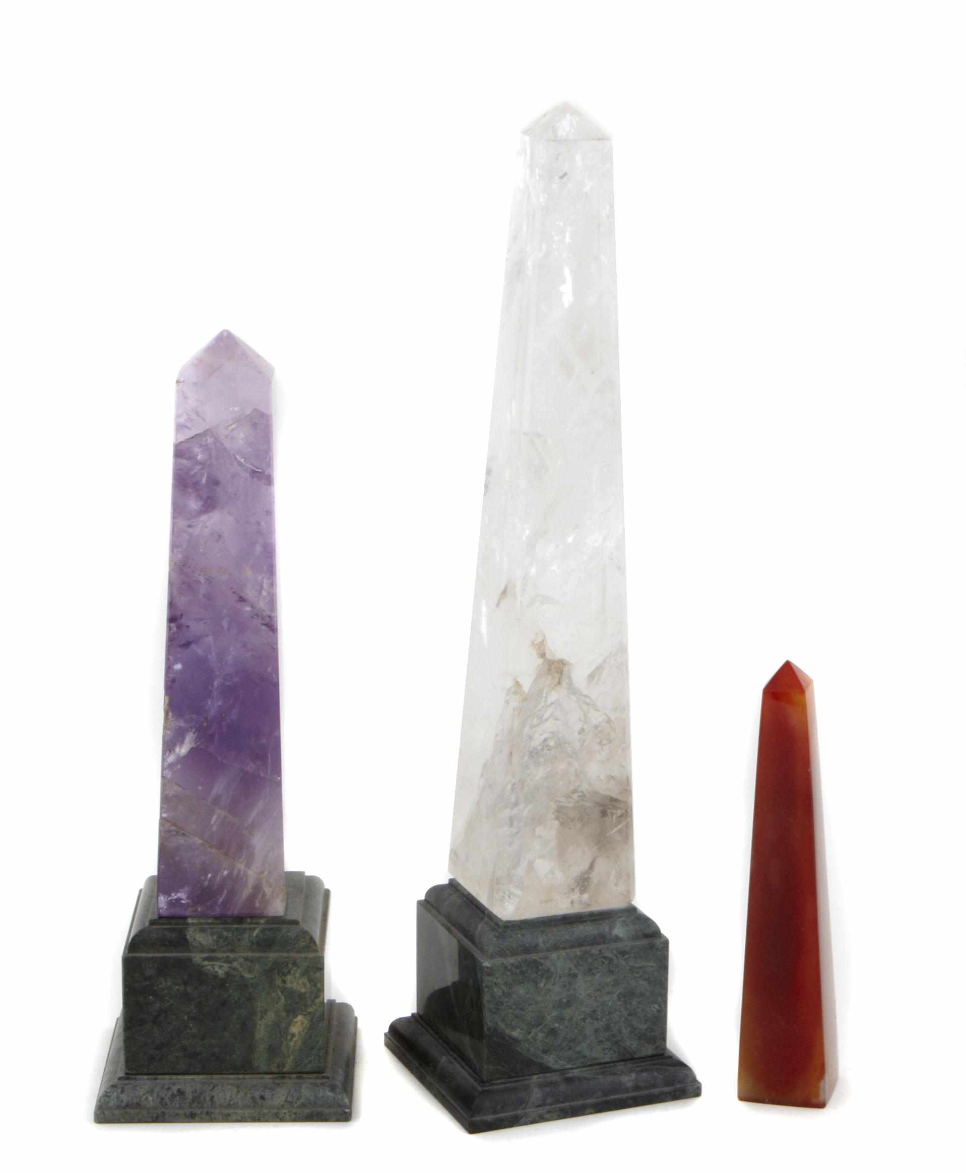 Appraisal: A group of three polished hardstone obelisks Comprising a crystal