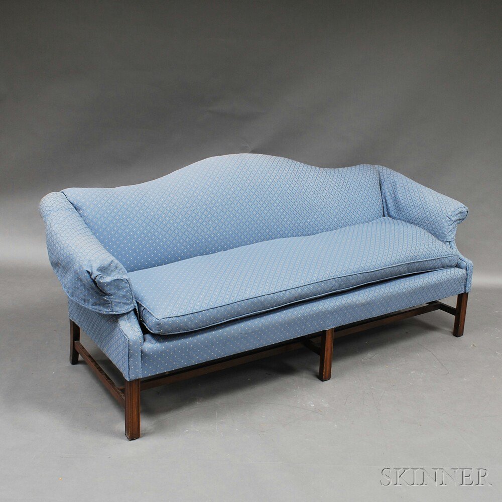 Appraisal: Chippendale-style Mahogany Camelback Sofa with blue upholstery and molded Marlborough