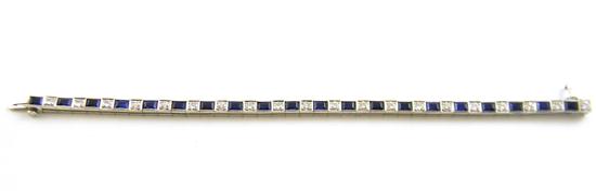 Appraisal: Diamond and synthetic sapphire line bracelet stamped and tested iridium