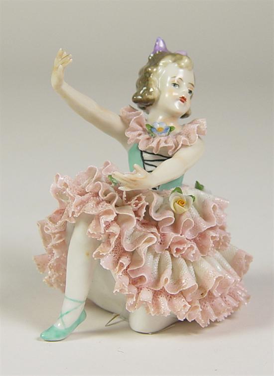 Appraisal: German Dresden Ballerina Ballerina in a curtsey sitting position Pink