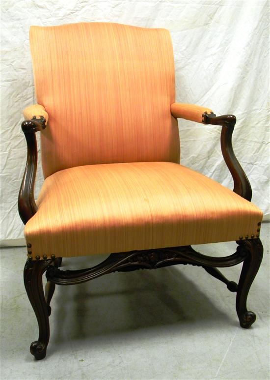 Appraisal: Open Chippendale-style armchair scroll feet turned stretchers rose-colored upholstery exposed