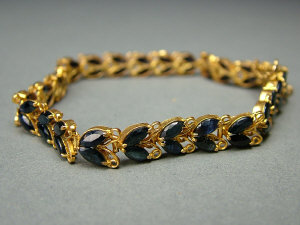 Appraisal: An Indian K gold and sapphire double row bracelet of