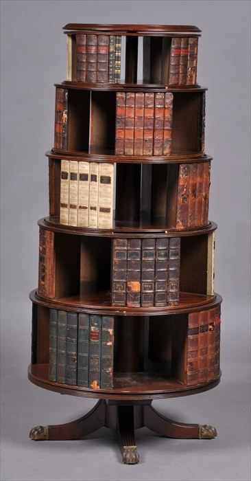 Appraisal: REGENCY MAHOGANY REVOLVING BOOKCASE Incorporating six graduated revolving tiers fitted