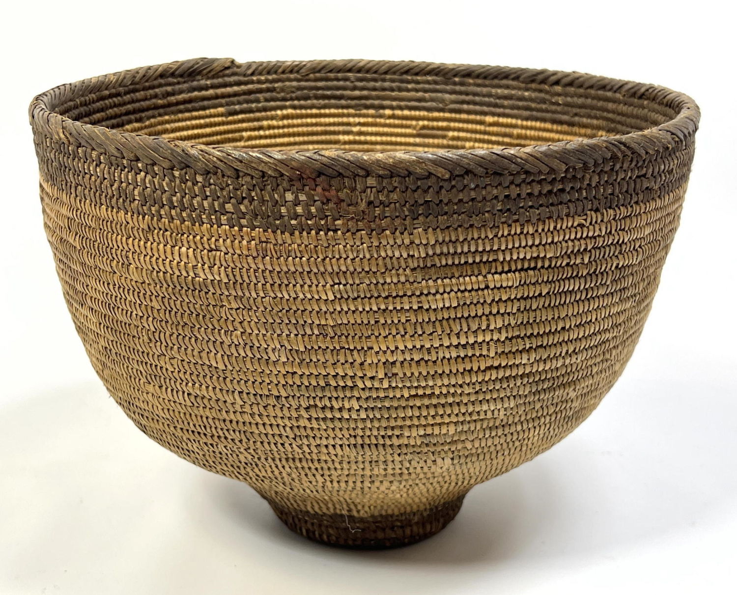 Appraisal: th century Indian coil basket Dimensions H inches W inches