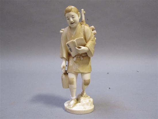 Appraisal: JAPANESE IVORY OKIMONO OF A YOUNG MAN th C Walking