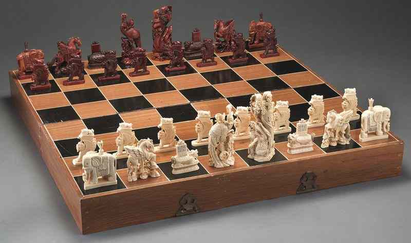 Appraisal: Chinese carved and stained ivory chess set International buyers should