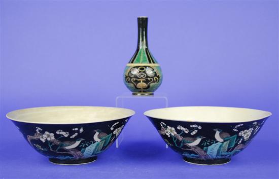 Appraisal: PAIR OF CHINESE FAMILLE NOIR BOWLS bearing Kangxi marks diameter