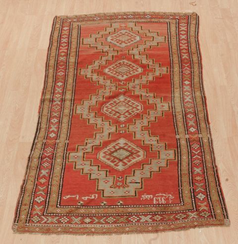 Appraisal: A fine Kazah rug the central panel with four diamond