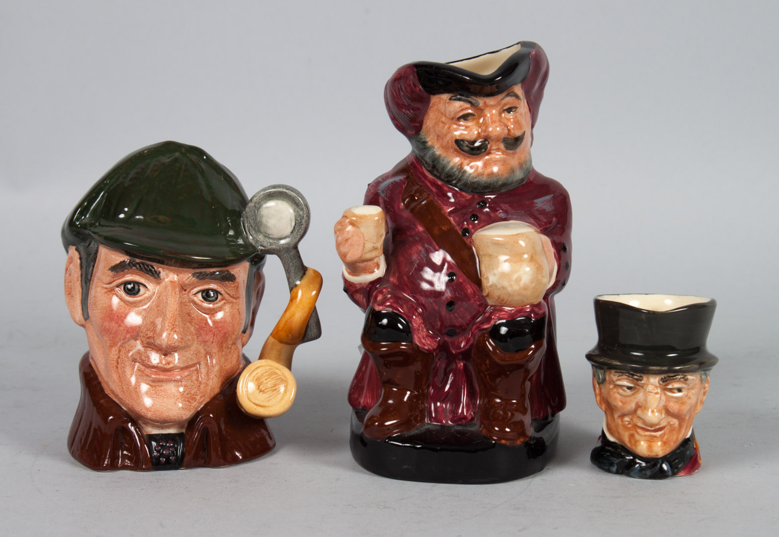 Appraisal: Three Royal Doulton toby and character jugs toby jug Falstaff